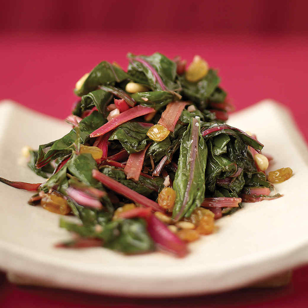 Sauteed spinach with golden raisins and toasted Pinoli pine nuts
